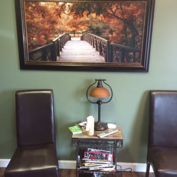 Auto Excel - Waiting room seating w/ cool painting - Auto Repair Near Me - Lexington, Kentucky Auto Excel - Waiting room seating w/ cool painting - Auto Repair Near Me - Lexington, Kentucky