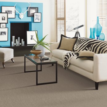 Pacific Coast Floors - a living room with blue accents - Flooring Near Me - Victoria, British Columbia Pacific Coast Floors - a living room with blue accents - Flooring Near Me - Victoria, British Columbia
