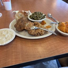 Chicken fried steak, white gravy, yams, green beans, wheat roll--combo plate. Chicken fried steak, white gravy, yams, green beans, wheat roll--combo plate.