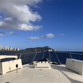 PCK Nautical - Heading toward Diamond Head for the sea burial. - Boat Charters Near Me - Honolulu, Hawaii