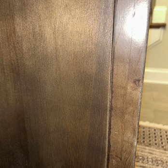 Ashley Store - Marker at the base of table to cover up scratches-- shoddy job - Furniture Stores Near Me - Buford, Georgia