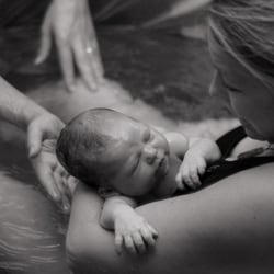 Love Warrior Birth Services - A beautiful, empowered water birth at home -- thanks to Loni & Stephanie!  (Photo captured by Stephanie)