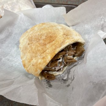 Sam's Kabab Gyro - a close up of a sandwich - Greek Near Me - Nashville, Tennessee Sam's Kabab Gyro - a close up of a sandwich - Greek Near Me - Nashville, Tennessee