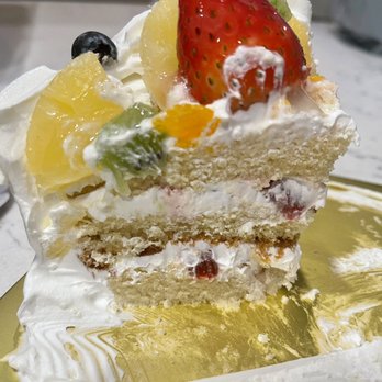 Olive Bakery - Fresh fruit and whipped cream cake. Layered with whipped cream and strawberry and topped with pineapple, kiwi, strawberry and blueberries. - Bakeries Near Me - Lakewood, Washington Olive Bakery - Fresh fruit and whipped cream cake. Layered with whipped cream and strawberry and topped with pineapple, kiwi, strawberry and blueberries. - Bakeries Near Me - Lakewood, Washington