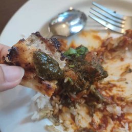 Naan was burnt and basted with butter