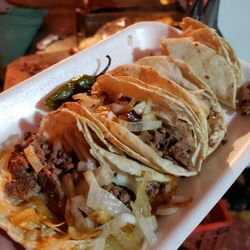 Tacos Delfino - Tacos de carne asada with grilled onions