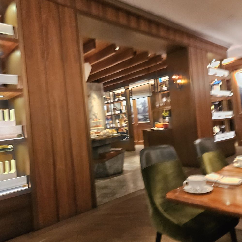 It is a very beautiful elegant space looking toward the central buffet area. It is a very beautiful elegant space looking toward the central buffet area.