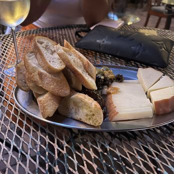 Lagniappe - Cheese, bread, plate - Music Venues Near Me - Miami, Florida Lagniappe - Cheese, bread, plate - Music Venues Near Me - Miami, Florida