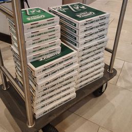 Assortment of pizza and wings Assortment of pizza and wings
