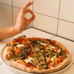 Eggplant pizza with pesto is the business.