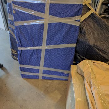 Clutter - Table tops are wrapped in blankets to prevent damage - Self Storage Near Me Clutter - Table tops are wrapped in blankets to prevent damage - Self Storage Near Me