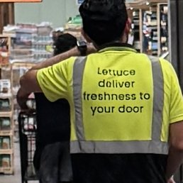 Associate talking on his phone (Apple watch) Associate talking on his phone (Apple watch)