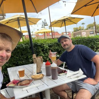 Smokin J's BBQ - Sean and Tom enjoying ribs, brisket with mac and cheese. - Barbeque Near Me - Poway, California Smokin J's BBQ - Sean and Tom enjoying ribs, brisket with mac and cheese. - Barbeque Near Me - Poway, California