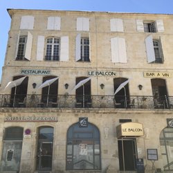 Le Balcon - Front of restaurant. There is outdoor seating. Go one flight up.