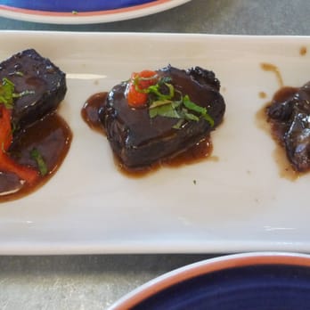La Bodega - Hot tapas: Costillas Cortas, $13, Spanish short ribs* spiced with smoked paprika & a chipotle-apricot wine reduction. - Tapas Bars Near Me - Kansas City, Missouri