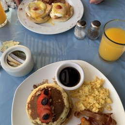 Pancakes with scrambled eggs and eggs Benedict with salmon Pancakes with scrambled eggs and eggs Benedict with salmon