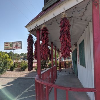 Chile Addict - red peppers hanging from the roof of a restaurant - Herbs & Spices Near Me - Albuquerque, New Mexico