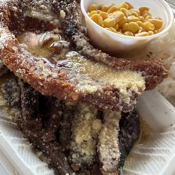 Mops Central - My rib eye and pork chops with garlic butter and parmigiana cheese.  So good! - Food Trucks Near Me - Waipahu, Hawaii