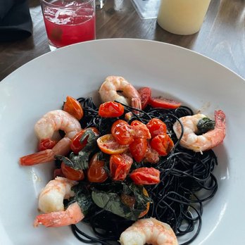El Moro Spirits & Tavern - Squid ink pasta with shrimp and the Gato In A Sombrero cocktail. - New American Near Me - Durango, Colorado