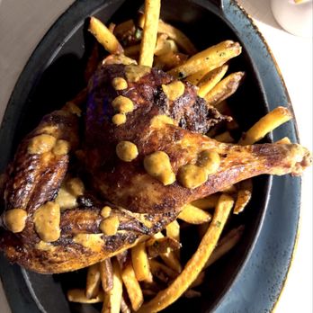 The Pony Room - Rotisserie Chicken and Frites with a Dijon sauce - Bars Near Me - Rancho Santa Fe, California The Pony Room - Rotisserie Chicken and Frites with a Dijon sauce - Bars Near Me - Rancho Santa Fe, California