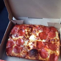 Little Caesars Pizza - The best lunch special in the city. $5.49 with tax. It also includes a soda.