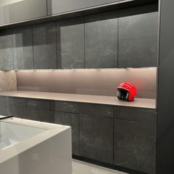 Absolute GM - Kitche Dekton Black Kitchen  Contemporary Kitchen, Seattle  A Dekton Kitchen made from cabinet Fenix surfaces with wrap stone cabinet doors.