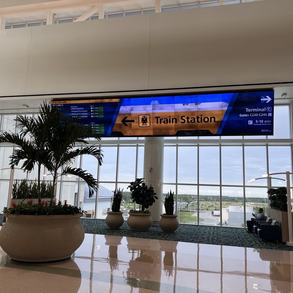 Brightline Orlando Station - Brightline entrance inside terminal c - Train Stations Near Me - Orlando, Florida Brightline Orlando Station - Brightline entrance inside terminal c - Train Stations Near Me - Orlando, Florida