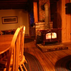 Maple Hill Farm - Dining room with a warm fire going