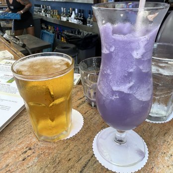 Tikis Grill & Bar - Ube Colada - Seafood Near Me - Honolulu, Hawaii Tikis Grill & Bar - Ube Colada - Seafood Near Me - Honolulu, Hawaii