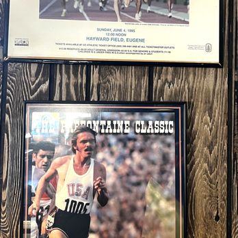Track Town Pizza - Prefontaine Classic ads throughout the dining area. - Pizza Near Me - Eugene, Oregon