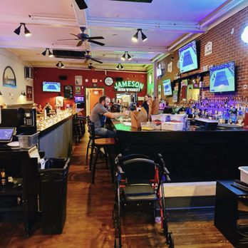 KKatie's Burger Bar - a man sitting at the bar - Burgers Near Me - Hyannis, Massachusetts