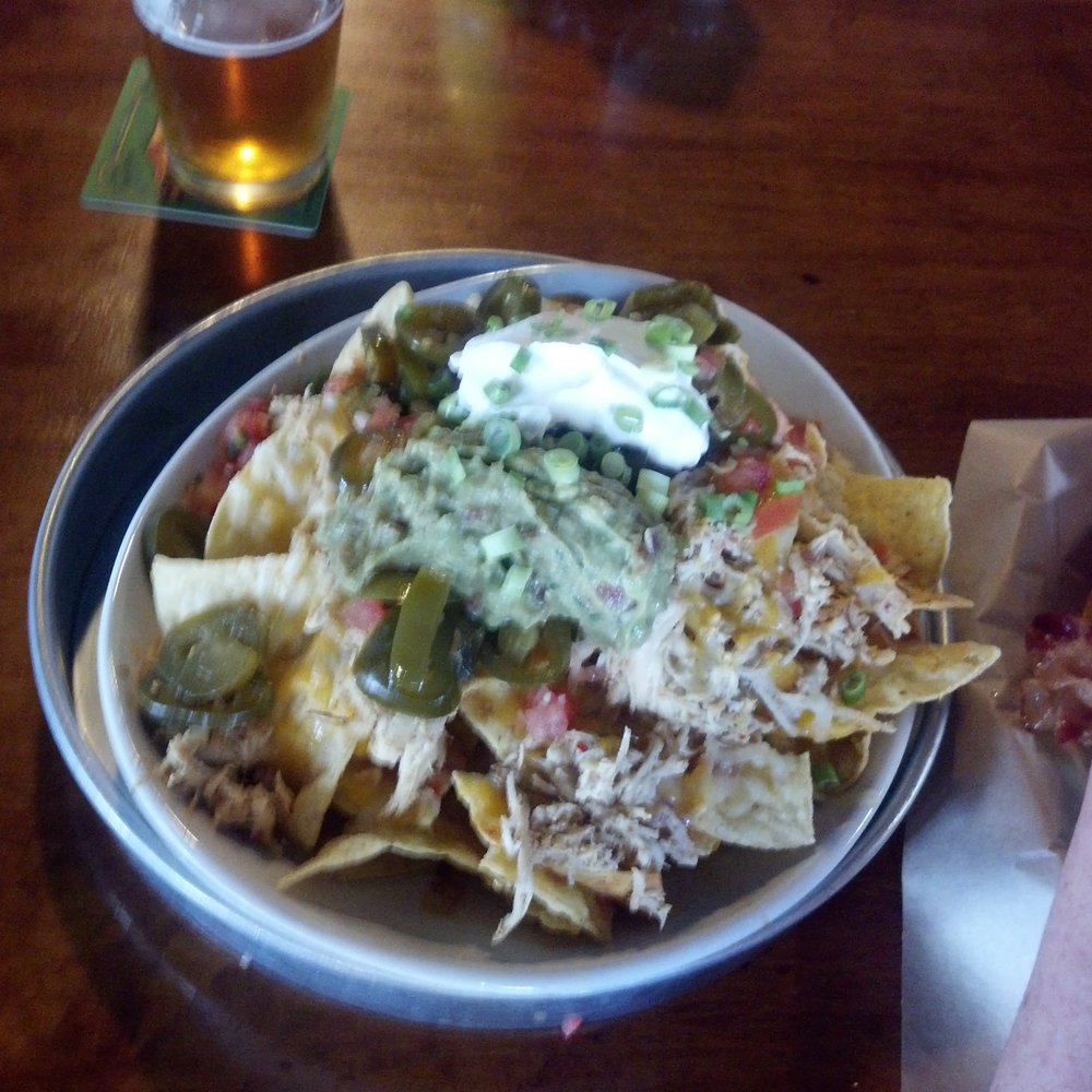 Bar 101 Eats & Drinks - Huge plate of Nachos with shredded chicken that is full of flavor. You can also get Beef or carnitos. - Sports Bars Near Me - Roseville, California Bar 101 Eats & Drinks - Huge plate of Nachos with shredded chicken that is full of flavor. You can also get Beef or carnitos. - Sports Bars Near Me - Roseville, California
