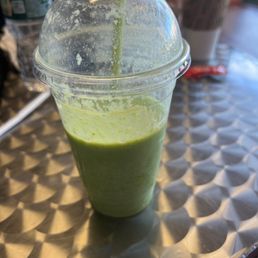Kale banana smoothie. Couldn't wait to drink it for the picture. Kale banana smoothie. Couldn't wait to drink it for the picture.