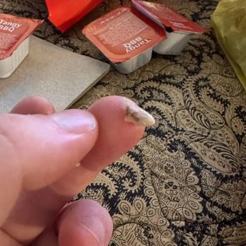 McDonald's - A piece of bone found into a chicken nugget, almost broke a tooth biting into this - Burgers Near Me - Cape Coral, Florida McDonald's - A piece of bone found into a chicken nugget, almost broke a tooth biting into this - Burgers Near Me - Cape Coral, Florida