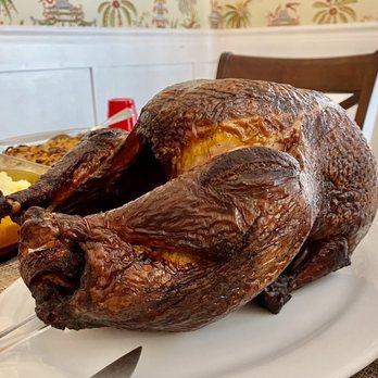 Greenberg Smoked Turkeys - a whole turkey on a plate - Specialty Food Near Me - Tyler, Texas