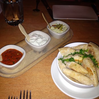 Lola - konpasti, red pepper dip and tzatziki with pita - Greek Near Me - Seattle, Washington Lola - konpasti, red pepper dip and tzatziki with pita - Greek Near Me - Seattle, Washington