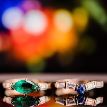 Amir H Mozaffarian - Wedding ring is on the right. Found a lighter sapphire to compliment my emerald on the left (engagement ring) - Jewelry Near Me - Corte Madera, California Amir H Mozaffarian - Wedding ring is on the right. Found a lighter sapphire to compliment my emerald on the left (engagement ring) - Jewelry Near Me - Corte Madera, California