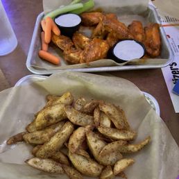 Potato Wedges + 6 piece medium (sauce) traditional wings. Potato Wedges + 6 piece medium (sauce) traditional wings.