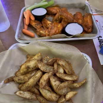 Buffalo Wild Wings - Potato Wedges + 6 piece medium (sauce) traditional wings. - Chicken Wings Near Me - Charlotte, North Carolina Buffalo Wild Wings - Potato Wedges + 6 piece medium (sauce) traditional wings. - Chicken Wings Near Me - Charlotte, North Carolina