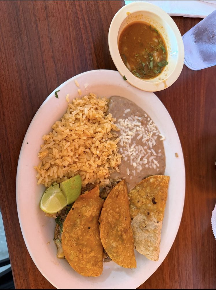 Taqueria Los Dos Potrillos Logo