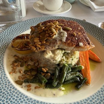 Maligne Lake - Wonderful salmon on bed of quinoa with vegetables. Perfectly cooked fish. The roasted lemon half a nice touch. - Boating Near Me Maligne Lake - Wonderful salmon on bed of quinoa with vegetables. Perfectly cooked fish. The roasted lemon half a nice touch. - Boating Near Me