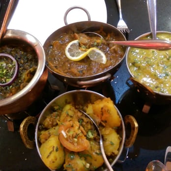 Chilli Spice - Lamb & Chicken Balti, Shatkora Chicken, Dahl, and Bombay Aloo (clockwise) - Indian Near Me - Camberley, SRY Chilli Spice - Lamb & Chicken Balti, Shatkora Chicken, Dahl, and Bombay Aloo (clockwise) - Indian Near Me - Camberley, SRY