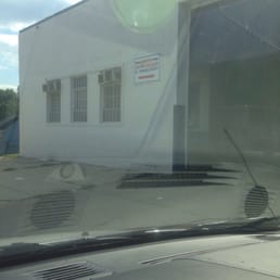 The rock dent is barely recognizable now.  thanks guys!