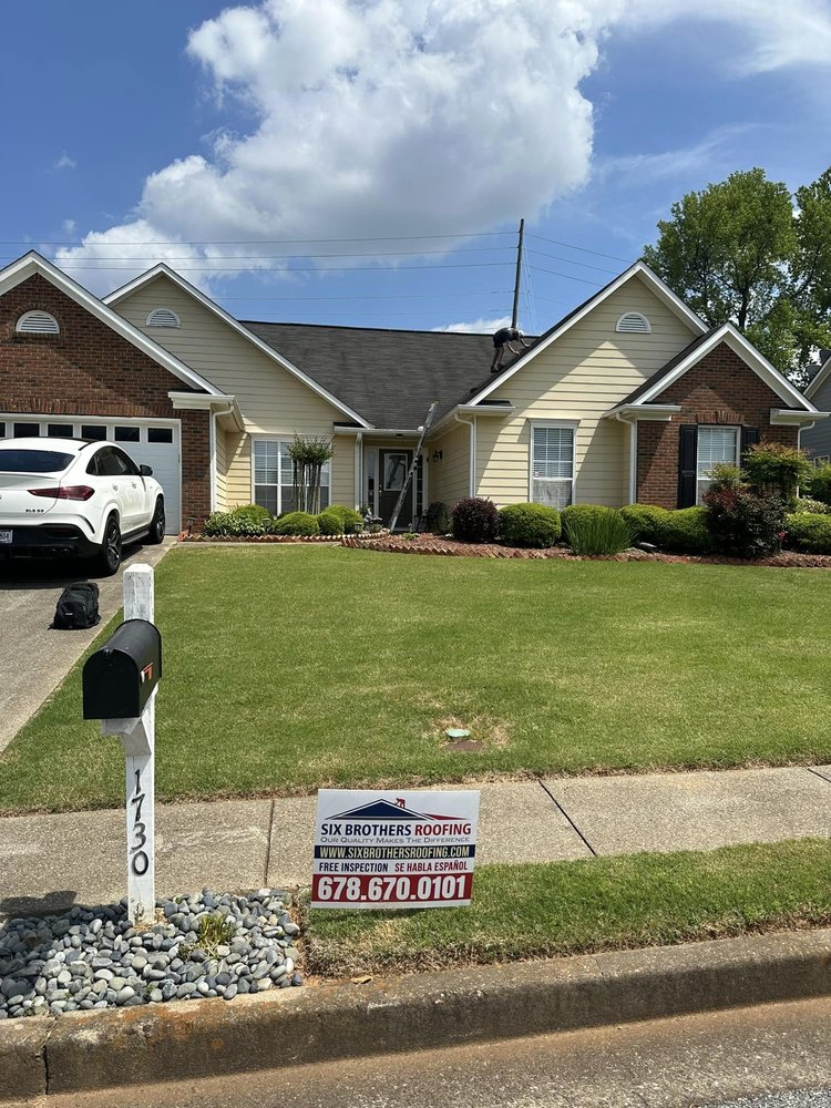 Slide of Six Brothers Roofing