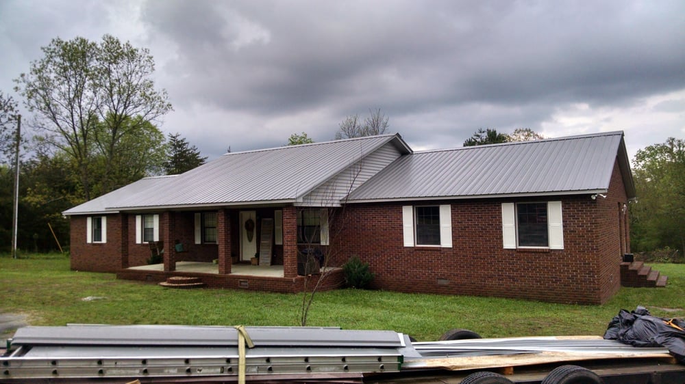 Slide of JC Metal Roofing