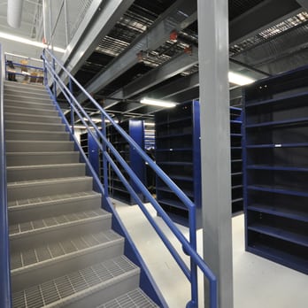NovaEquip - Mezzanine, staircase, and shelving in a parts department. - Auto Parts & Supplies Near Me - Baltimore, Maryland NovaEquip - Mezzanine, staircase, and shelving in a parts department. - Auto Parts & Supplies Near Me - Baltimore, Maryland
