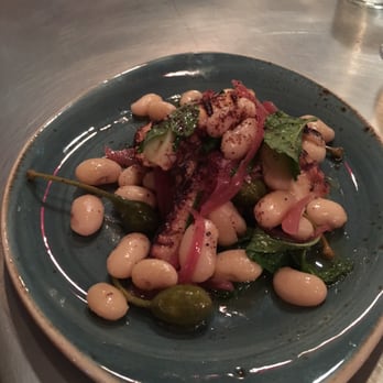 FIG Restaurant - Grilled Octopus with caper berries, cranberry beans, sherry vinegar, and mint - Bars Near Me - Santa Monica, California FIG Restaurant - Grilled Octopus with caper berries, cranberry beans, sherry vinegar, and mint - Bars Near Me - Santa Monica, California