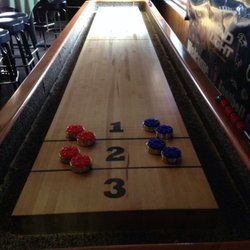 Neighborhood Pub & Grill - Free Shuffle board. Leagues are available also.