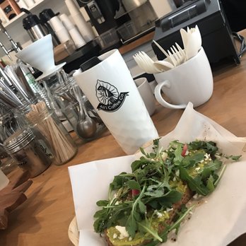 Ali'i Coffee - Honolulu - ALMOND ROCA (almond, chocolate, macadamia, cream) and AVOCADO TOAST (with pickled onion, feta, greens) - Coffee & Tea Near Me - Honolulu, Hawaii