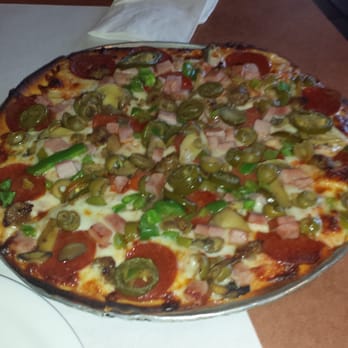 Tony's Pizza - Tony's Special with Jalapenos added and burnt crust at the top. - Pizza Near Me - Ogden, Utah Tony's Pizza - Tony's Special with Jalapenos added and burnt crust at the top. - Pizza Near Me - Ogden, Utah